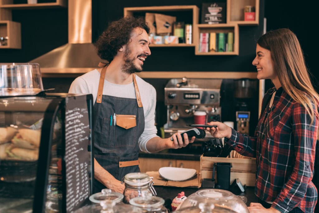 Tattoo Stack Merchant and Customer with Credit Card Machine